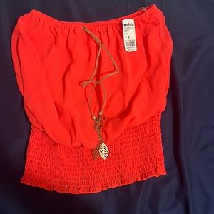 Hot Pink Tube Top with necklace feather necklace attached.